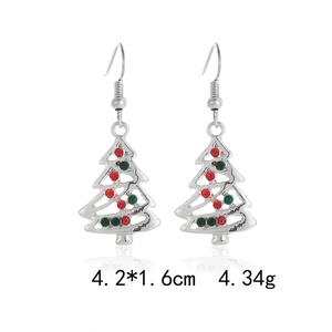 Detail view of silver Christmas tree earrings with red and green rhinestones, 4.2x1.6cm