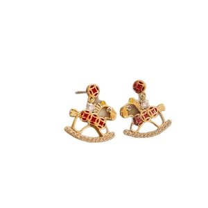 Creative rocking horse stud earrings with gold plating, red enamel, and zircon accents