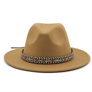 Detail of khaki wool fedora hat featuring colorful ethnic woven decorative band