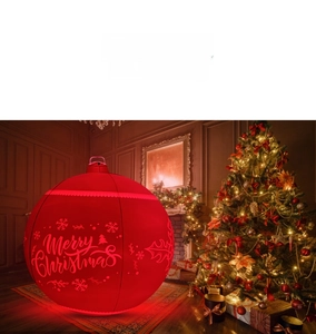 Detail of red 60cm inflatable Christmas ball with Merry Christmas text and LED light effect
