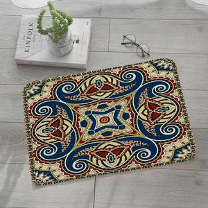 Detail of bohemian mandala flannel mat on grey wooden floor with lifestyle accessories