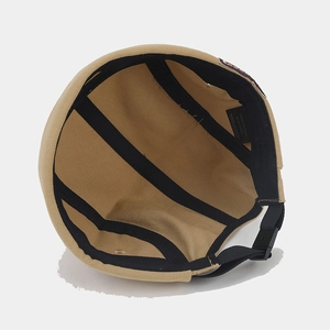Khaki cotton docker cap with adjustable strap and reinforced inner black brim piping
