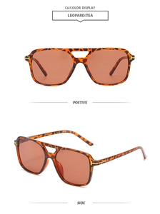 Detail of vintage leopard square sunglasses with double bridge and gold T-shaped hinge