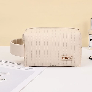 Minimalist beige PU leather cosmetic bag with vertical stitching and wide handle