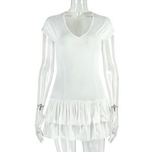 Detail of white slim fit mini dress featuring V-neck and double-layered ruffled hem
