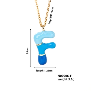 Detailed dimensions of gold initial F pendant with blue gradient enamel inlay