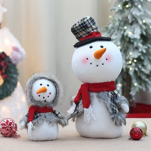 Family set of two plush snowman figurines with festive hats and scarves for Christmas decor