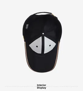 Interior view of black cotton baseball cap showing 6-panel structure and 100% cotton label