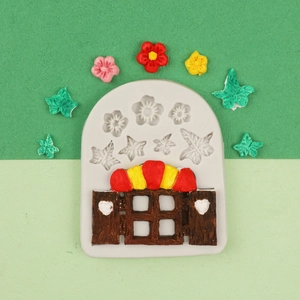 Detail of silicone mold for making miniature windows, 3D flowers, and leaves for fondant