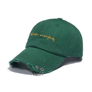 Distressed dark green cotton baseball cap with iron rings and yellow embroidery details