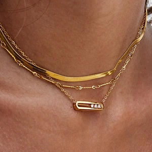 Layered 18K gold-plated stainless steel necklaces with a white diamond rectangular pendant