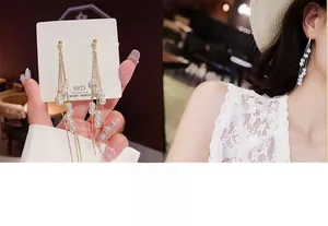 Detail of luxury S925 silver needle pearl tassel earrings with shimmering crystals