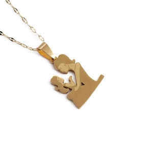 Golden Mother's Day necklace featuring a warm silhouette of a mother and child pendant