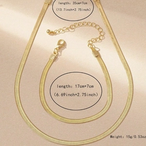 Golden snake chain jewelry set including flat necklace and bracelet with measurements
