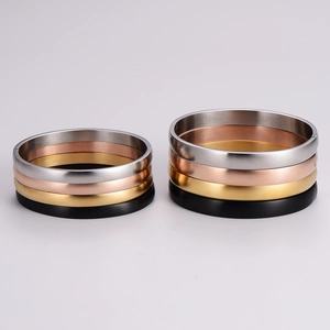 Minimalist matte stainless steel hinged bangles in gold, silver, rose gold, and black
