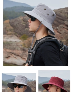 Detail of outdoor sun hat with metal air vents and adjustable chin strap