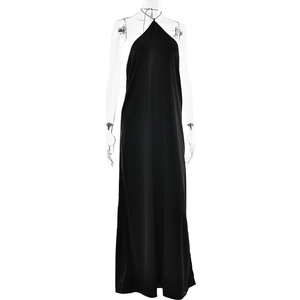 Detail of elegant black satin halter neck dress showing backless cut and side slit