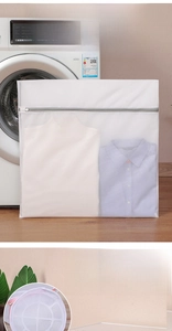 Detail of 3D cylindrical laundry bag and rectangular mesh pouch with protective zippers