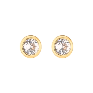 Macro view of gold bezel-set stud earrings with clear round cubic zirconia stones