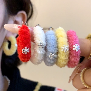 Winter flocking hoop earrings with metal snowflake pendants in five vibrant colors