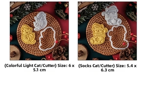 Detail of Christmas cat cookie cutters showing sizes and embossed festive kitten shapes
