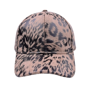 Detailed close-up of leopard print baseball cap with classic curved brim and six-panel crown