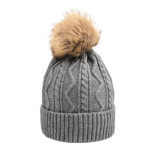 Classic grey cable knit beanie with a fluffy faux fur pom pom and ribbed cuff