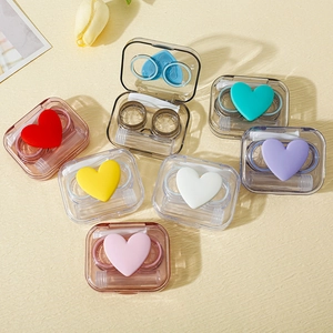 Portable clear contact lens case kit with colorful heart detail in six vibrant colors