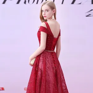 Lace sequin evening gown with open back lace-up design in elegant burgundy hue