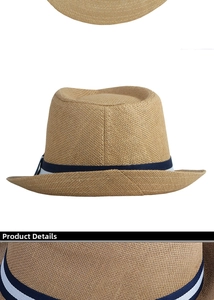 Detail of woven straw fedora featuring a blue and white striped band and fine texture