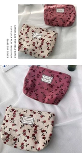 Detail showing vintage corduroy texture and floral patterns on travel storage bags
