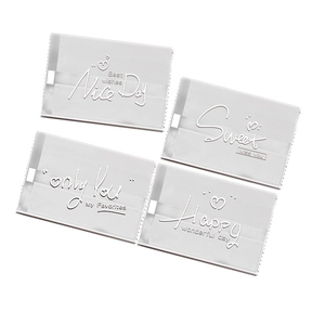 Frosted snowflake crisp packaging bags with white festive lettering for nougat cookies