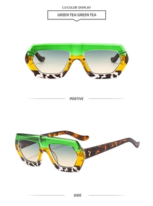 Detailansicht der mehrfarbigen Oversize-Sonnenbrille mit Verlaufsgläsern in Grüntee-Optik