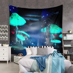 Detail of glow-in-the-dark mushroom forest tapestry on a modern bedroom wall