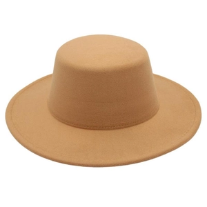 Detail view of the fine texture and stiff brim on this camel flat top wool felt boater hat