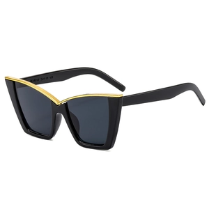Chic oversized cat-eye sunglasses with black frame and golden metal V-shape accent