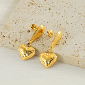 Minimalist 18K gold plated heart drop earrings on stone display for women
