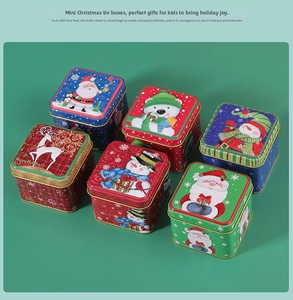 Detail showing six square Christmas tin boxes with Santa and reindeer festive patterns