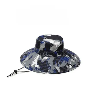 Close-up of camouflage sun hat with black mesh ventilation and adjustable chin strap