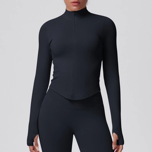 Detail of black slim fit sports jacket with stand collar and thumbhole cuffs design