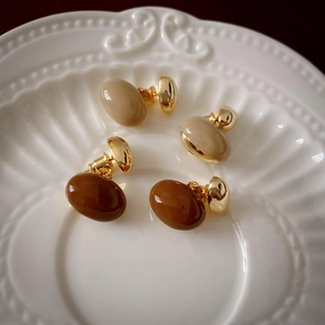 Retro khaki and caramel resin drop oil irregular bean stud earrings in gold plating