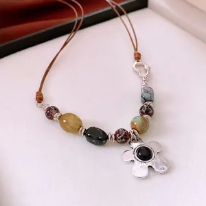 Vintage beaded flower necklace with multicolored resin beads and silver floral pendant