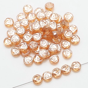 Detailed view of 10mm amber glass rose flower beads with golden finish for DIY jewelry
