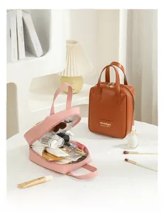 Detailed interior of shell-shaped PU leather makeup bag showing large storage capacity