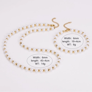 Detail view of pearl and gold bead necklace and bracelet set with size specifications
