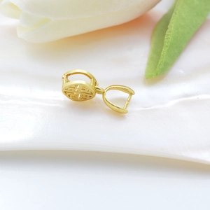 Diamond-shaped gold pendant clasp with traditional Fu character and white tulip accent