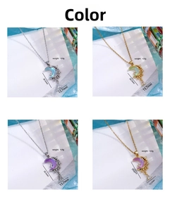 Variation collage of crescent moon pendants with zircons in four different colors