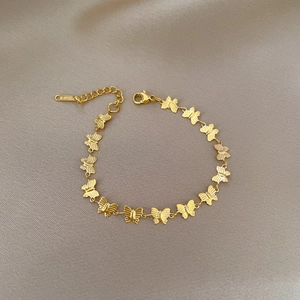 Minimalist gold butterfly link bracelet in titanium steel with adjustable lobster clasp