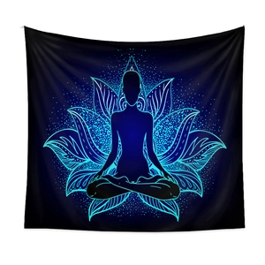 Macro shot of meditation tapestry fabric showing the lotus mandala and silhouette details