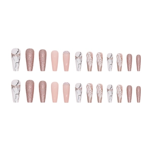 Long ballet press-on nails with champagne glitter, marble texture, and rhinestone accents